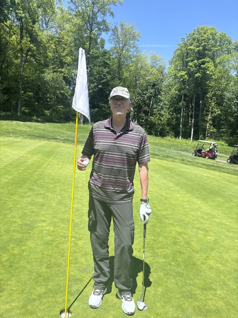 Al Deluca after hitting a hole in one on Hole 12 at the 2026 Wilcoxson Fathers Club Golf Tournament.